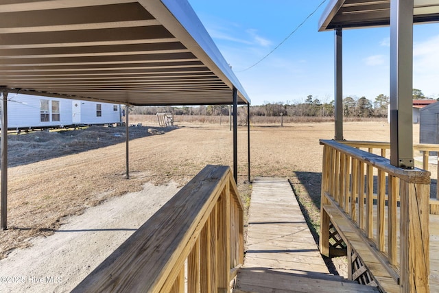 view of yard with a rural view