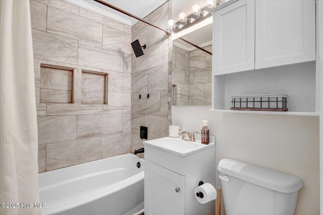 full bathroom featuring toilet, shower / bath combo with shower curtain, and vanity