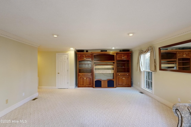 unfurnished living room with baseboards, recessed lighting, crown molding, visible vents, and light colored carpet
