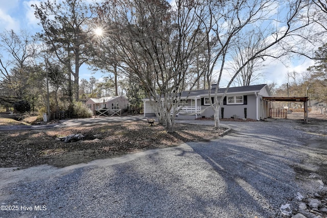 view of front of home with a carport