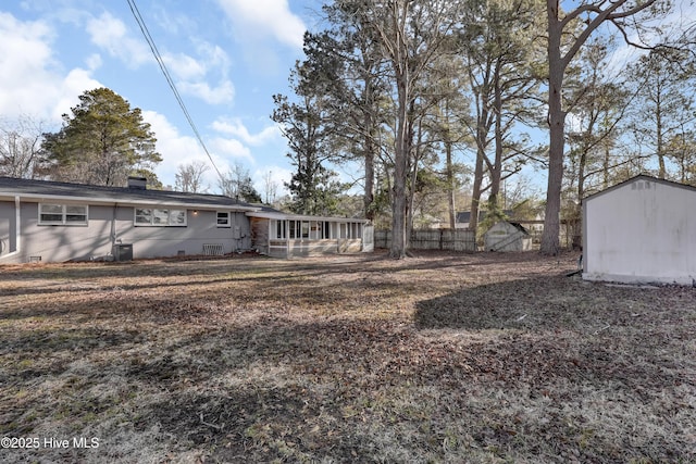 view of yard featuring central AC