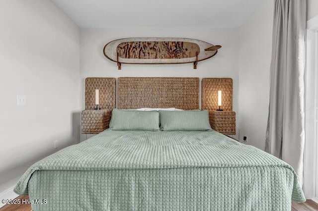 1788 New River Inlet Rd, North Topsail Beach, NC 28460 - bedroom featuring wood finished floors