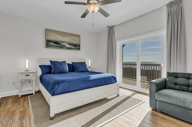 1788 New River Inlet Rd, North Topsail Beach, NC 28460 - bedroom featuring access to outside, wood finished floors, and a ceiling fan