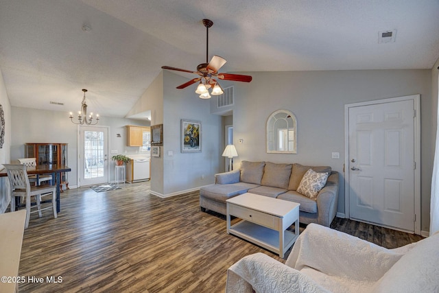 living room with lofted ceiling, dark hardwood / wood-style flooring, ceiling fan with notable chandelier, and a textured ceiling