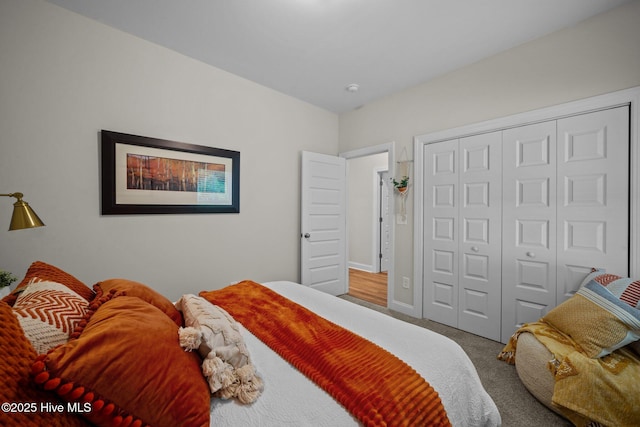 carpeted bedroom featuring a closet