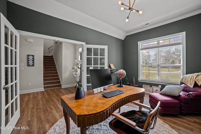 office area featuring ornamental molding, dark wood-type flooring, french doors, and a chandelier