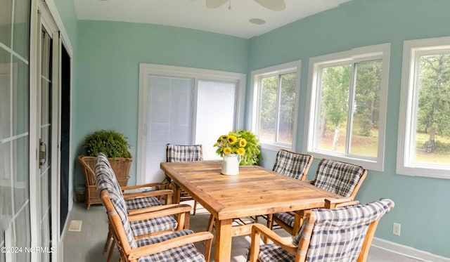 sunroom featuring a healthy amount of sunlight and ceiling fan