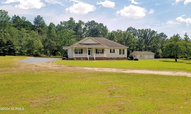 view of front facade with a porch and a front lawn