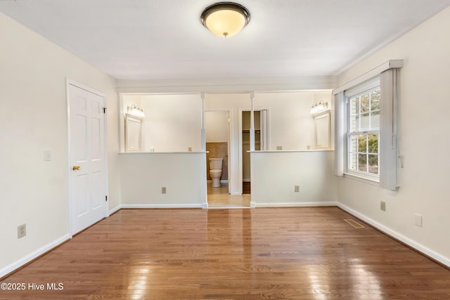 empty room featuring hardwood / wood-style floors