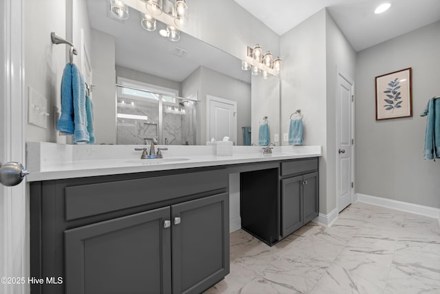 bathroom featuring vanity and an enclosed shower