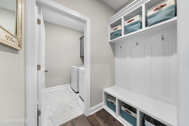 mudroom with independent washer and dryer