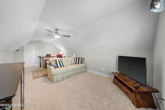 bedroom with ceiling fan, light colored carpet, and lofted ceiling