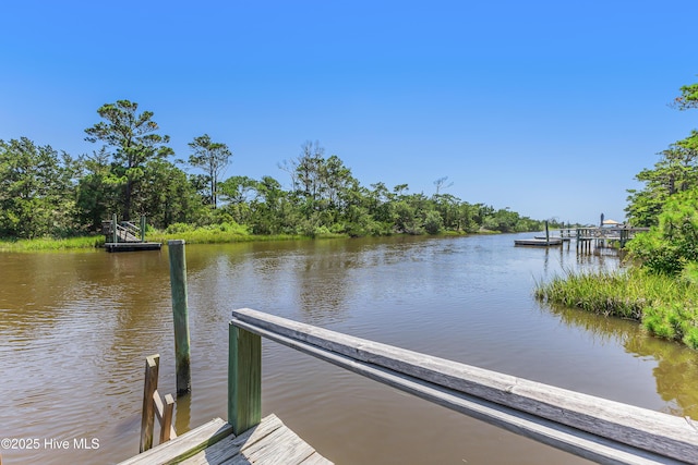11 White Ln, Oak Island, NC 28465 - dock area with a water view