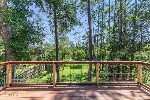 11 White Ln, Oak Island, NC 28465 - view of wooden deck