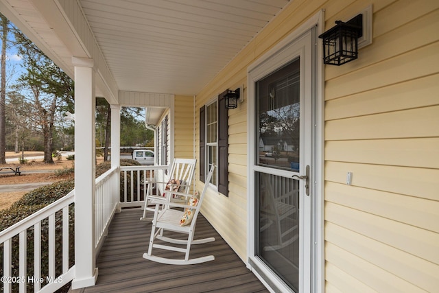 wooden deck featuring a porch