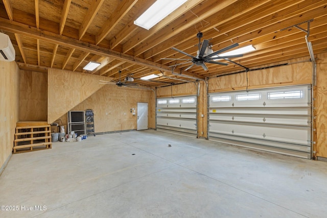 garage featuring wood walls