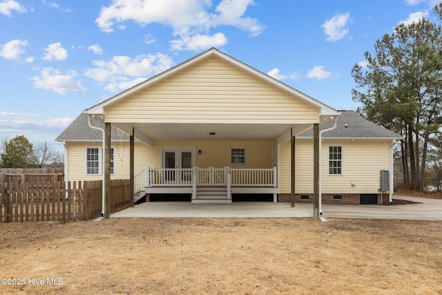 back of house with a patio, a deck, and french doors