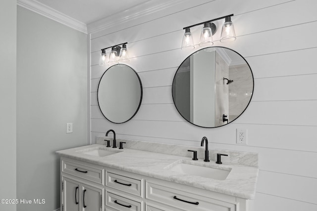 bathroom with vanity and ornamental molding