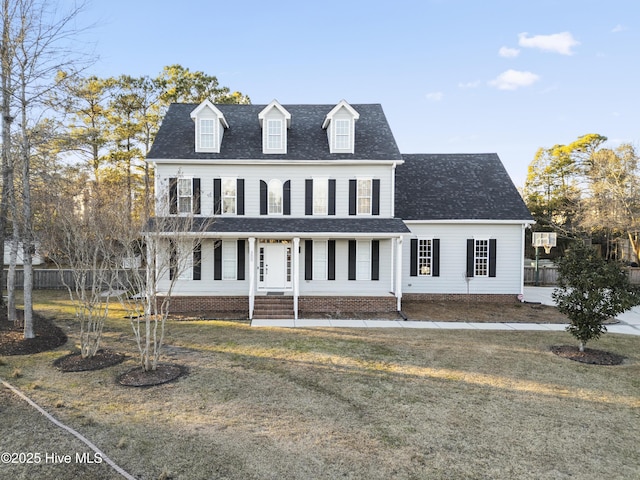 view of front of home featuring a front yard