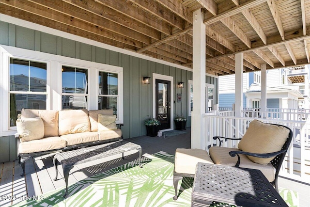 view of patio / terrace featuring an outdoor living space and french doors