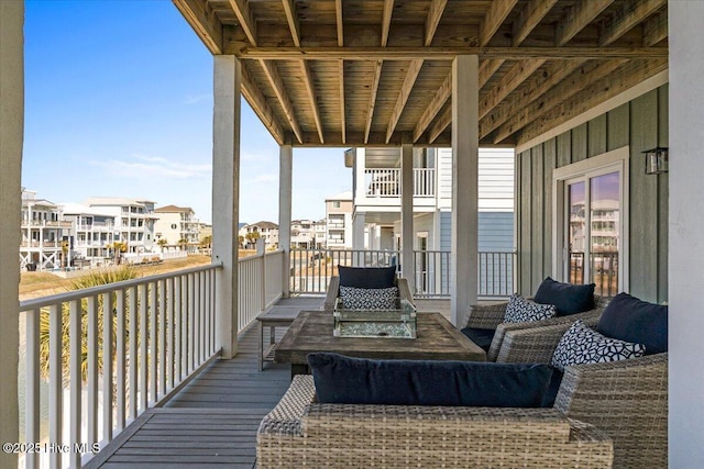 balcony featuring a residential view and an outdoor hangout area