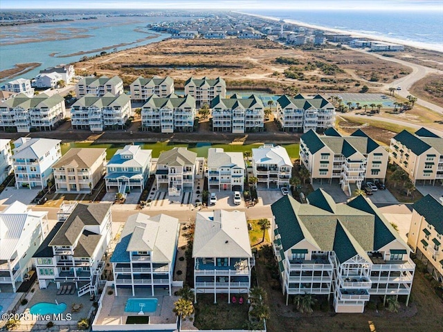 aerial view with a water view and a residential view