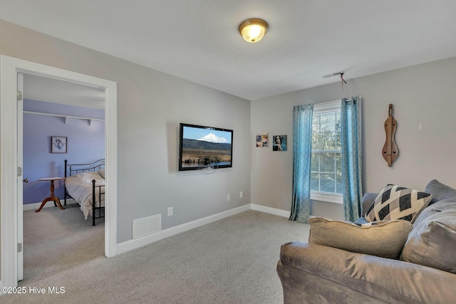 living room with light colored carpet