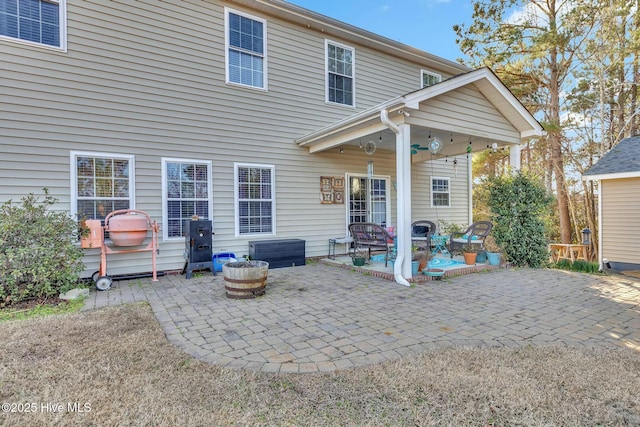 rear view of property with a patio