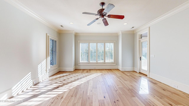 unfurnished room with ceiling fan, light hardwood / wood-style flooring, and ornamental molding