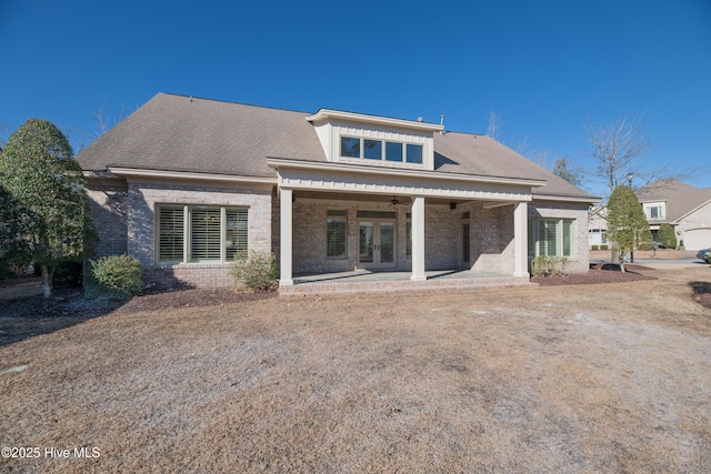 back of house featuring ceiling fan and a patio area