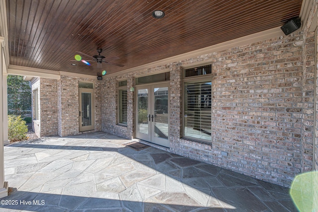 view of patio featuring ceiling fan and french doors