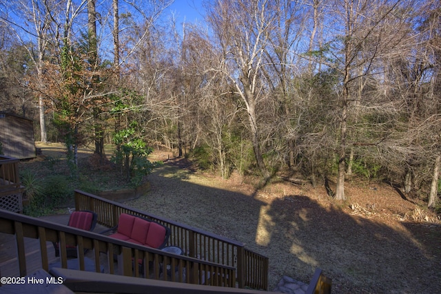 view of yard with a wooden deck