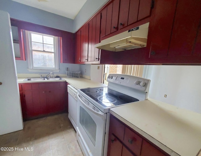 kitchen featuring sink, white appliances, and light tile patterned floors