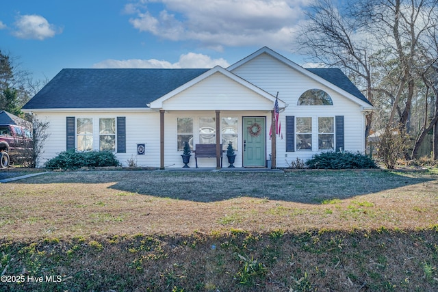 ranch-style house featuring a front yard and a porch