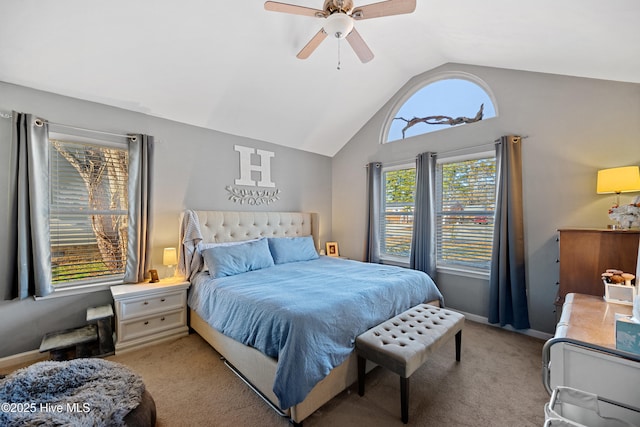 carpeted bedroom featuring vaulted ceiling and ceiling fan