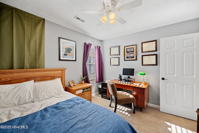 bedroom featuring ceiling fan and light carpet