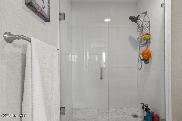 bathroom with an enclosed shower