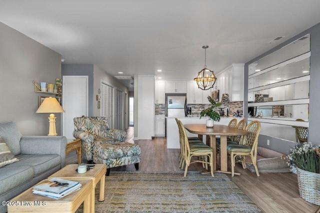 dining space featuring dark hardwood / wood-style floors