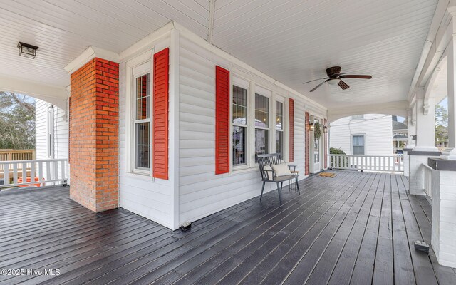 entryway with french doors, dark hardwood / wood-style flooring, and a notable chandelier