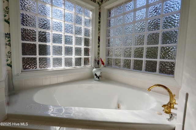 bathroom featuring a washtub