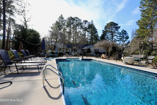 view of pool with a patio area