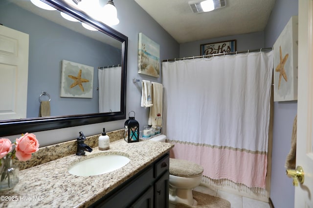 bathroom featuring tile patterned floors, toilet, a textured ceiling, vanity, and a shower with shower curtain