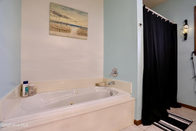 bathroom featuring a bathing tub and tile patterned flooring