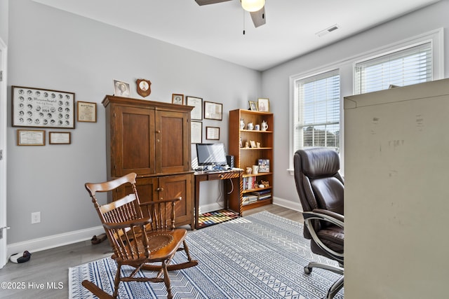 office featuring ceiling fan and hardwood / wood-style floors