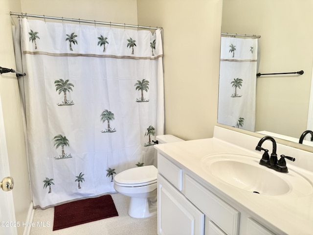 bathroom with a shower with shower curtain, toilet, and vanity