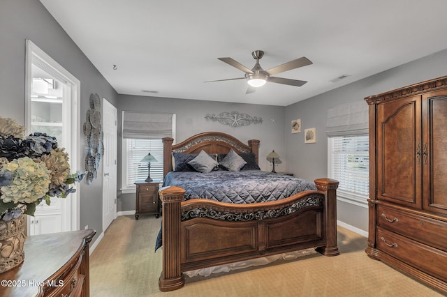 carpeted bedroom featuring ceiling fan