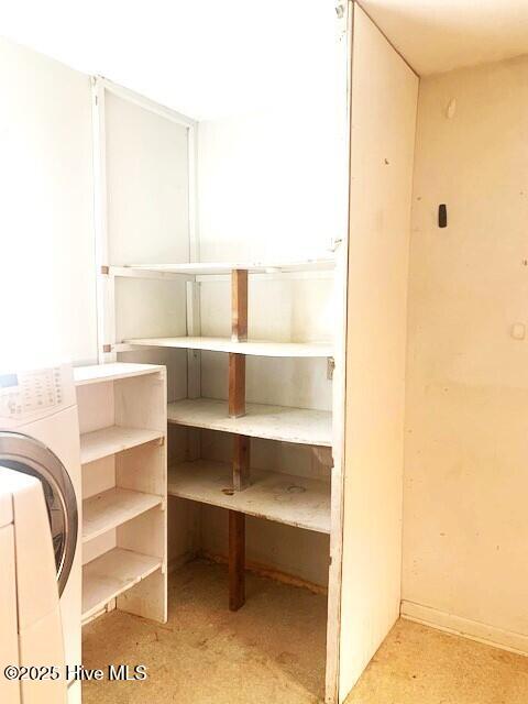 pantry with washer / clothes dryer