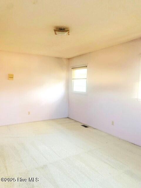 empty room with carpet floors