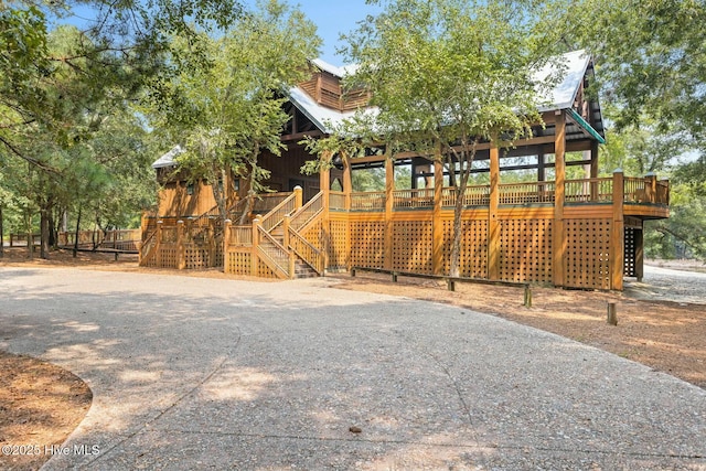 view of playground with a deck