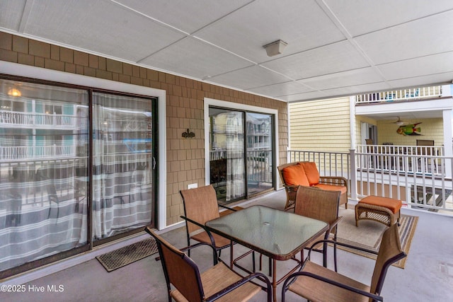 1503 Carolina Beach Ave N Unit 1D, Carolina Beach, NC 28428 - view of patio / terrace featuring a balcony and outdoor dining space